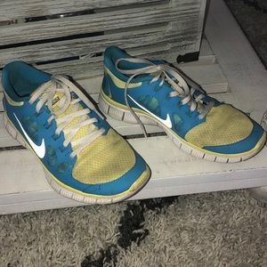 BLUE AND YELLOW NIKES